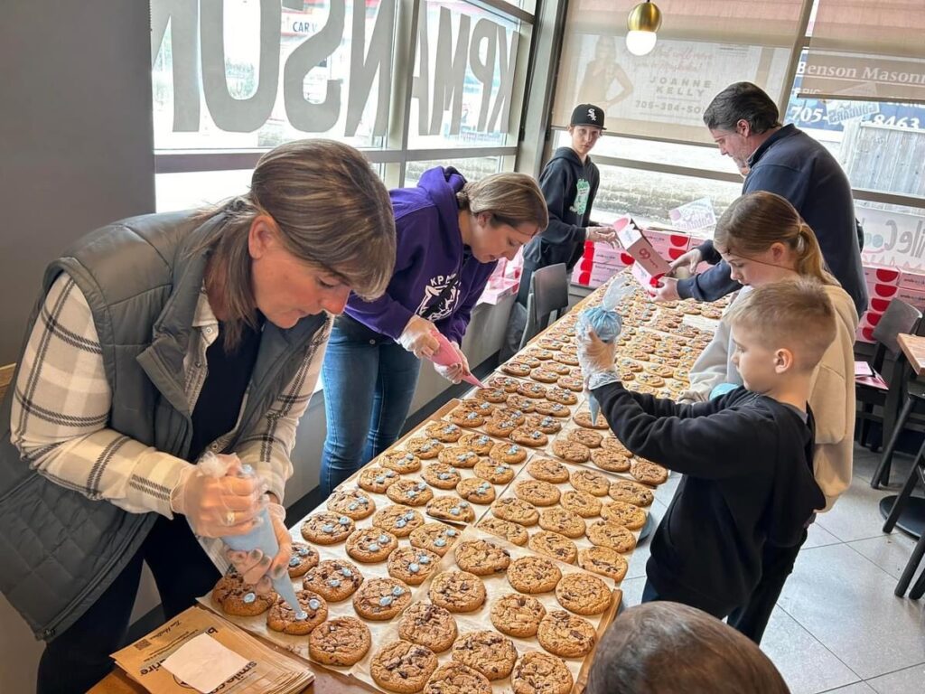Tim Hortons Smile Cookie campaign funds donated to K.P. Manson Public School